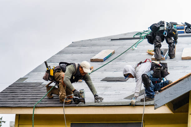 Professional Gutter Installation technician working in Atwater, CA